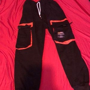 Black and orange jogger pants